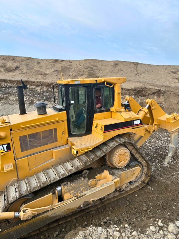 John on a CAT Bulldozer